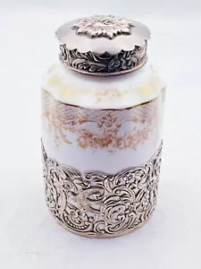 Teiera inglese vintage argento sterling e porcellana con uccellini e cherubini 10249 - Foto 1 di 12