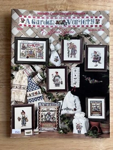 A GARDEN VARIETY ALMA LYNNE CROSS STITCH PATTERN BOOK BIRDHOUSES, GARDENING LADY - Picture 1 of 2