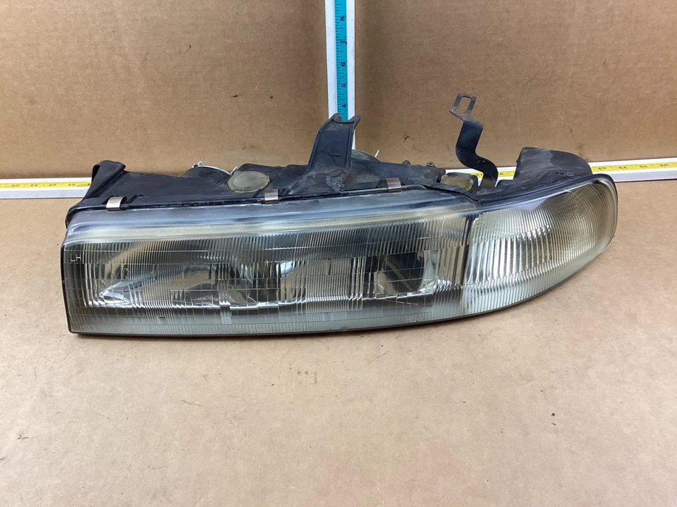 1992-1995 Mazda 929 Front Left Driver Side Headlight Assembly - Image 1 of 4