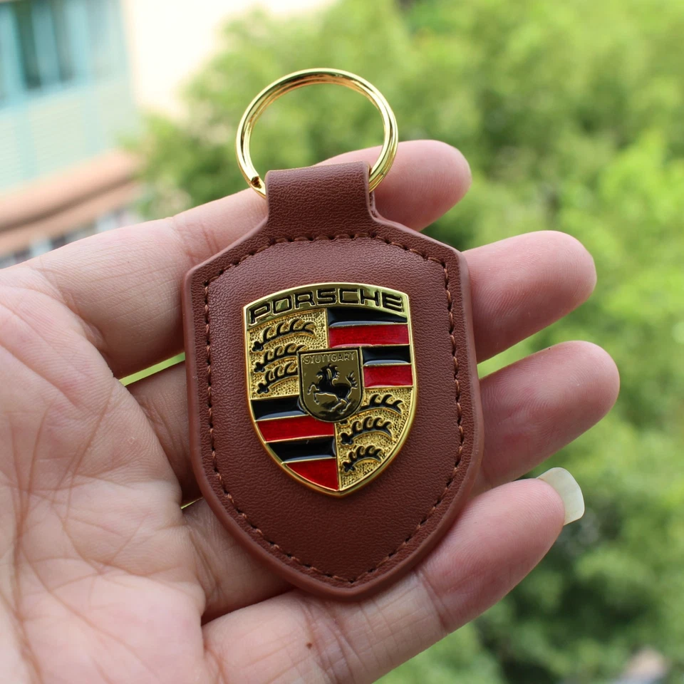 NUEVO EN STOCK EE. UU. Porsche Crest Sheild Llavero de cuero Envío gratuito Elige tu color Foto 1 de 1