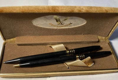 Bolígrafo y lápiz mecánico Centennial tono negro y dorado en estuche metálico ve Foto 1 de 4