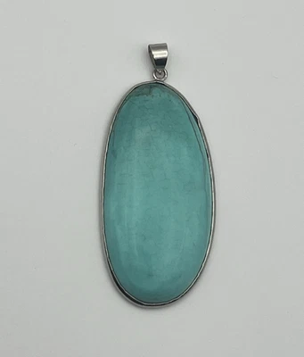 Colgante grande imitación turquesa ovalado tono plata 2 1/4"L Foto 1 de 4