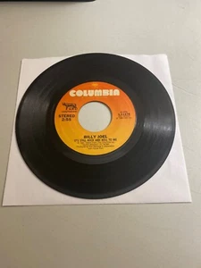 BILLY JOEL – IT'S STILL ROCK AND ROLL TO ME / THROUGH THE LONG NIGHT 7" 45 RPM - Picture 1 of 2
