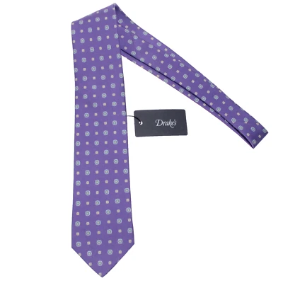 Corbata Drake's nueva con etiquetas en púrpura con patrón geométrico azul/amarillo/blanco 100 % seda Foto 1 de 4