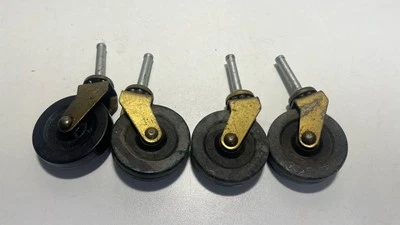Set of 4 Vintage Brass & Rubber Swivel Caster Wheels – Stem Mount - Image 1 of 4
