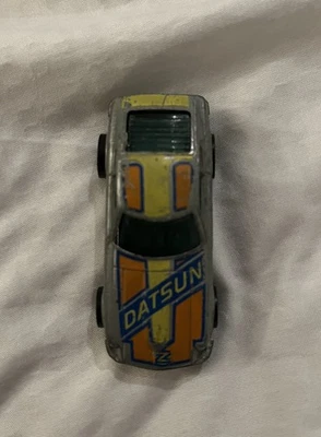 1976 Винтажный Hot Wheels Z Whiz Datsun Blackwall оранжевый и желтый игрушечный автомобиль литой - Изображение 1 из 2