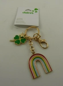 Trébol arco iris trébol estrella llavero llavero bolso etiqueta tono dorado - Imagen 1 de 6