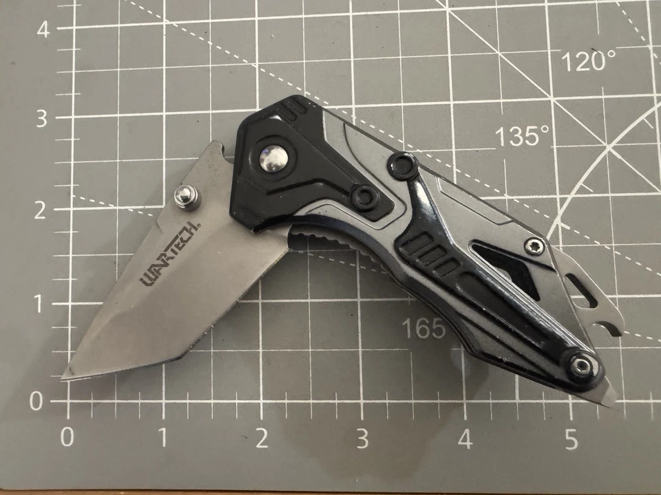 Cuchillo Plegable WARTECH PWT395BK Aluminio/Negro Mango con Botella Abierta e Interruptor Foto 1 de 4