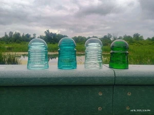 4 CD 102 GLASS INSULATORS. GOOD COLOR. - Picture 1 of 7