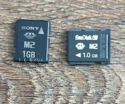 SANDISK & SONY 2x 1GB M2 MEMORY CARD PLUS ADAPTER FREE POSTAGE - Image 1 of 2