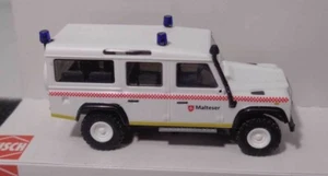 Busch H0 50319 Land Rover Defender "Malteser" nuovo e confezione originale - Foto 1 di 4