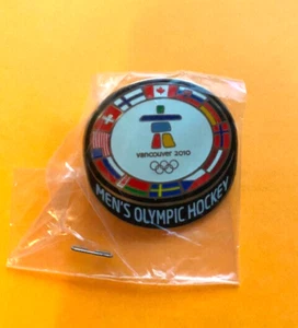 VANCOUVER OLYMPICS PIN MENS ICE HOCKEY PUCK NOC FLAG OF NATIONS PIN NEW - Picture 1 of 1
