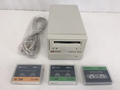 HP JetStore 6000 External Tape Drive C1529A W/2 Tapes & 1 Cleaning Cartridge - Image 1 of 4