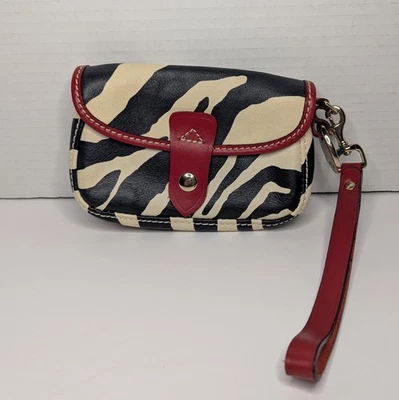 Cartera sin asas Dooney & Bourke de cuero con estampado de cebra negra Foto 1 de 4