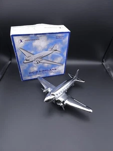 Eliche girevoli motore attrito aereo giocattolo vintage Schylling latta DC-3 - Foto 1 di 14