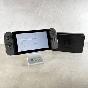 NINTENDO SWITCH CONSOLE Nero Completa + Caricatore - Foto 1 di 11