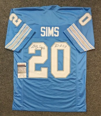 CAMISETA DE LOS DETROIT LIONS BILLY SIMS AUTOGRAFIADA FIRMADA CON INSCRIPCIÓN CERTIFICADO DE AUTENTICIDAD JSA Foto 1 de 3