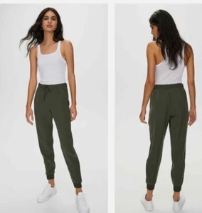 The Group by Babaton Olive Green Electron Jogger Travel Pant Medium Casual NWOT - Picture 1 of 11