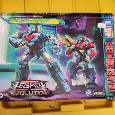TRANSFORMERS LEGACY - HUMBLE ORIGINS 2-PACK  - SENATOR SHOCKWAVE & ORION PAX - Image 1 of 4