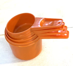 Juego incompleto de 4 tazas medidoras Tupperware naranja quemado apilable 1 C - 1/4 c - Imagen 1 de 3