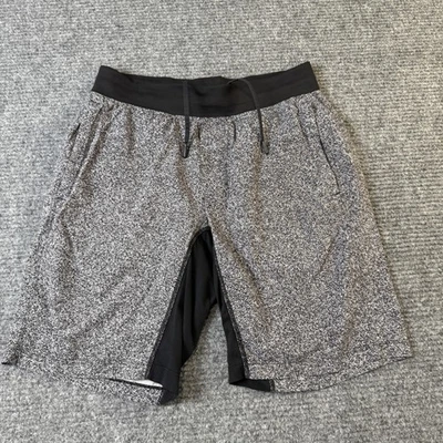Pantalones Cortos Lululemon Para Hombre Medianos Negros Gris Forro Entrenamiento Atlético Correr Bolsillos Logo Foto 1 de 4