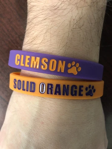 Clemson Tigers Wristbands Bracelets NCAA "CLEMSON" "SOLID ORANGE" Set Of 2 Cover