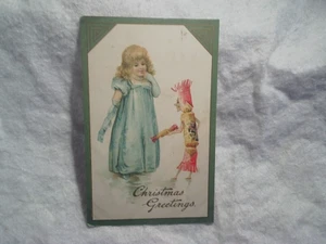 1909 AUGURI NATALIZI CANDYMAN CARAMELLE E BAMBINA CARTOLINA, 24 dicembre, vigilia di Natale - Foto 1 di 2