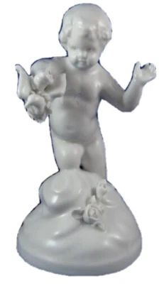 Antigua estatuilla putto francesa de porcelana figura de porcelana París Francia Foto 1 de 4