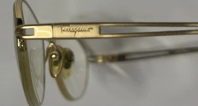 Monturas para gafas Salvatore Ferragamo solamente/tono dorado y alambre marrón medio borde Foto 1 de 4