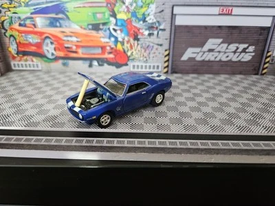 Chevrolet Camaro 1969 Johnny Lightning 1:64 base metálica neumáticos de goma combinados en muy buena condición Foto 1 de 4