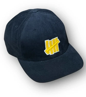 Raro Undefeated 5 Strike Sombrero de Cuero Ala Plana Muestra Gorra Negro Amarillo Leer más Foto 1 de 4