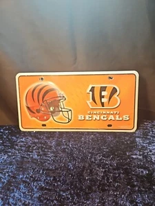 CINCINNATI BENGALS TWO LOGO METAL ORANGE BROWN LICENSE PLATE 6" X 12" NEW NFL - Picture 1 of 7