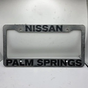 Nissan Palm Springs California Silver Plastic License Plate Frame Front Rear - Picture 1 of 2