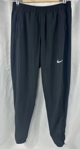 Pantalones de chándal Nike para hombre negros medianos flexibles esenciales tejidos Dri-Fit BV4833 para correr - Imagen 1 de 3