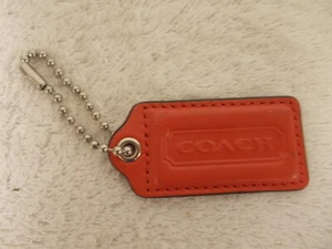 Llavero Coach de cuero rosa rojizo con etiqueta colgante - Imagen 1 de 2