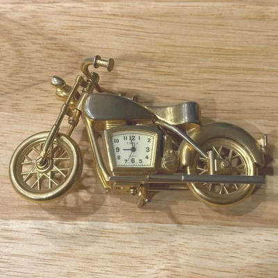 Vintage Timex Quartz Motorcycle Clock Gold Tone Metal Display tarnished - Image 1 of 4