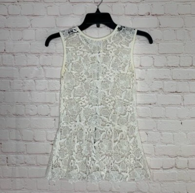 Top peplum sin mangas de encaje crochet #800 estilo marfil CAbi para mujer talla XS Foto 1 de 4