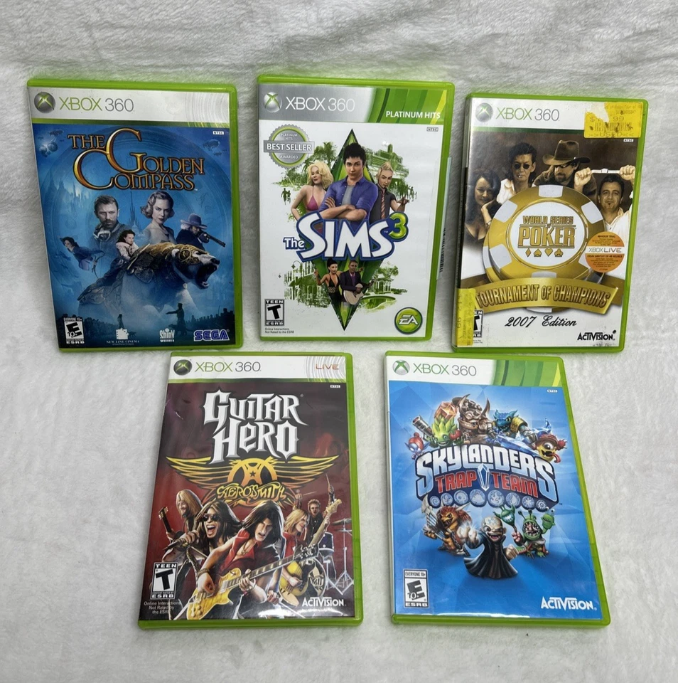 Lote Paquete de Juegos Xbox 360 Guitar Hero Sims Poker Skylanders Brújula Dorada Foto 1 de 1