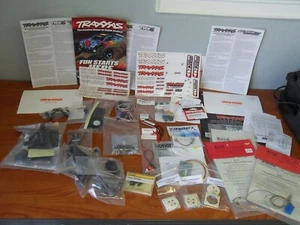 RC CAR TRUCK TRAXXAS DIGITRAX & OTHER PARTS BOOKS DECALS LOT AS PICTURED - Picture 1 of 24