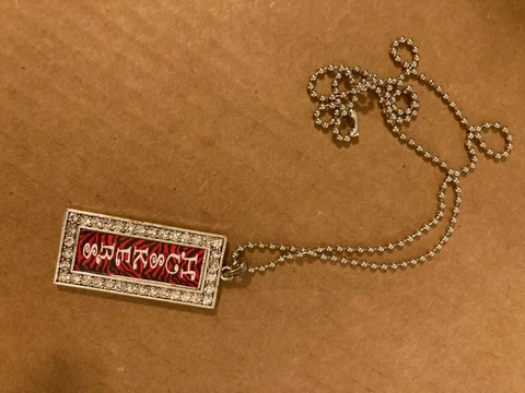 Vintage Nebraska Huskers Necklace Cover