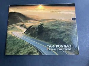 1984 Pontiac We Build Excitement Sales Brochure with Model/Engine Combinations - Picture 1 of 6