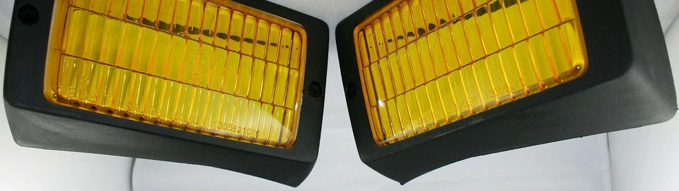 SET BOSCH YELLOW FOG LIGHT LENSES + FRAMES FOR PORSCHE 911 930 1984 - 1989 NEW Foto 1 de 3