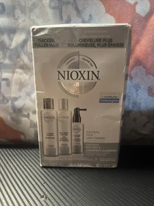 NIOXIN SYSTEM 1 SHAMPOO, BALSAMO E TRATTAMENTO CUOIO CAPELLUTO - Foto 1 di 1