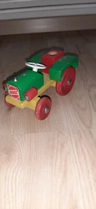 Heros Traktor aus Holz gelb-grün-rot mit Lenkung - Bild 1 von 4