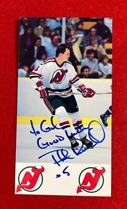 PHIL RUSSELL ~ Postal de la NHL emitida por el equipo firmado/autografiado ~ NJ Devils ~ Sin certificado de autenticidad - Imagen 1 de 7