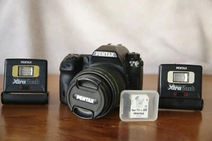 Pentax k5 ii with extras. Low shutter count 5,737, extra battery, 2 Xtra flashes - Picture 1 of 11