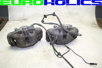 Par de pinças de freio dianteiro esquerda direita fabricante de equipamento original BMW F01 F10 550i 740i 11-16 com transportadores - Imagem 1 de 3