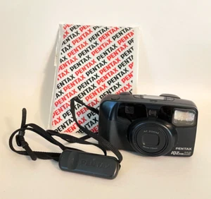 Vintage Pentax IQZoom 115 fotocamera punta e scatta pellicola 35 mm con telecomando e manuale - Foto 1 di 8