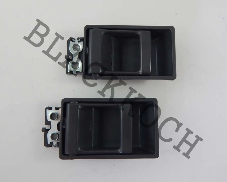Par de manijas interiores de puerta para camioneta Nissan Pathfinder WD21 Foto 1 de 2