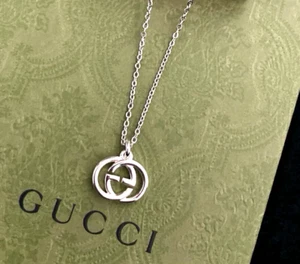 Collana Gucci ad incastro logo GG ciondolo uomo donna argento sterling 925 - Foto 1 di 5